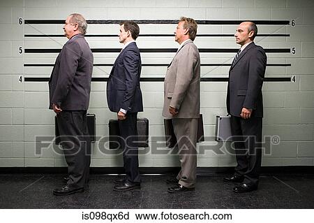 Stock Image - Businessmen in lineup. Fotosearch