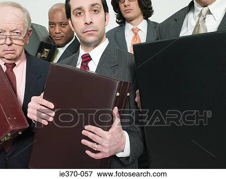 Businessmen with briefcases View Large Photo Image Stock Photo - Businessmen with briefcases. Fotosearch