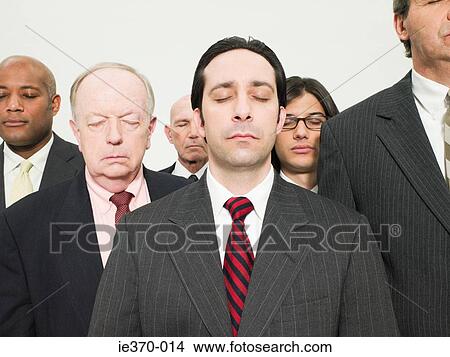 Businessmen with eyes closed View Large Photo Image Picture - Businessmen with eyes closed. Fotosearch