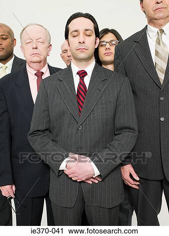 Businessmen with eyes closed View Large Photo Image Stock Image - Businessmen with eyes closed. Fotosearch