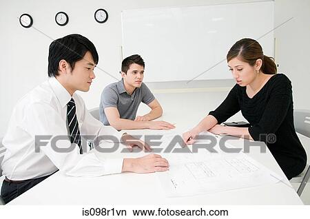 Picture - Businesspeople in a meeting. Fotosearch