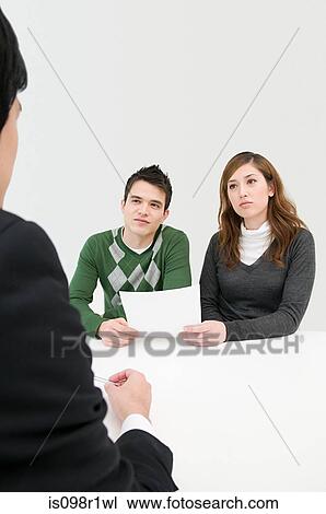 Stock Image - Businesspeople in a meeting. Fotosearch
