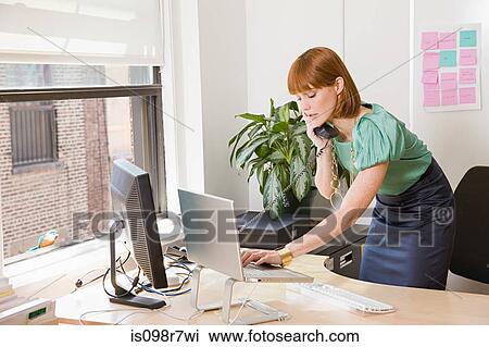 Businesswoman multitasking View Large Photo Image Stock Image - Businesswoman multitasking. Fotosearch