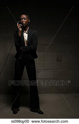 Stock Image - Businesswoman on telephone. Fotosearch