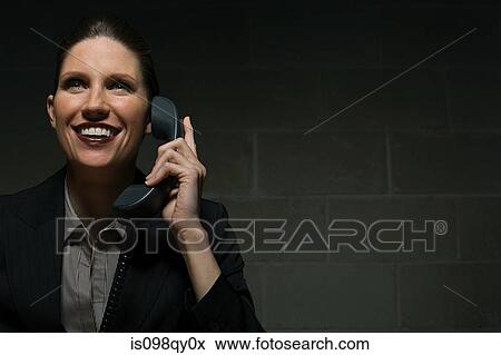 Businesswoman on telephone View Large Photo Image Stock Photo - Businesswoman on telephone. Fotosearch