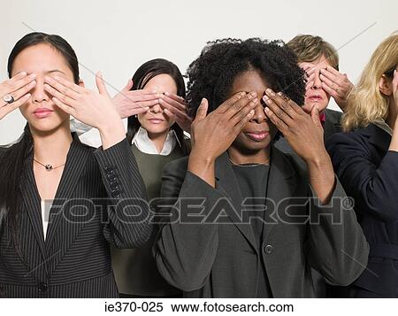 Businesswomen covering eyes View Large Photo Image Stock Photography - Businesswomen covering eyes. Fotosearch