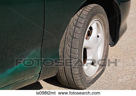 Car with flat tire View Large Photo Image Stock Photograph - Car with flat tire. Fotosearch