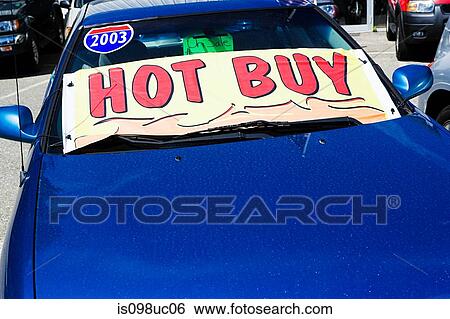 Stock Photograph - Car with sale sign. Fotosearch