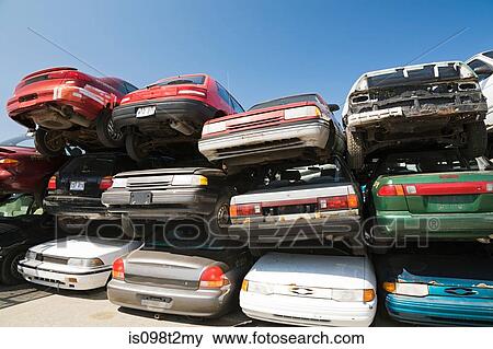 Cars at scrap yard View Large Photo Image Stock Photo - Cars at scrap yard. Fotosearch
