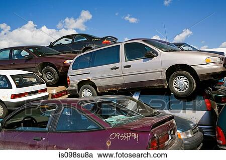 Cars in scrap yard View Large Photo Image Stock Image - Cars in scrap yard. Fotosearch