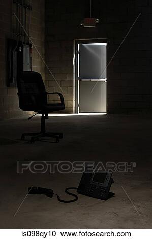 Chair and telephone in warehouse View Large Photo Image Stock Image - Chair and telephone in warehouse. Fotosearch
