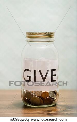 Stock Photography - Charity jar. Fotosearch