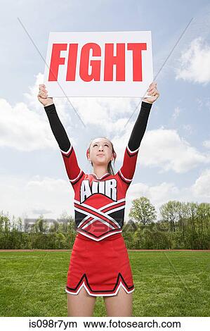 Cheerleader with fight sign View Large Photo Image Picture - Cheerleader with fight sign. Fotosearch
