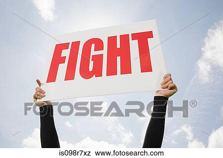 Cheerleader with fight sign View Large Photo Image Stock Photo - Cheerleader with fight sign. Fotosearch
