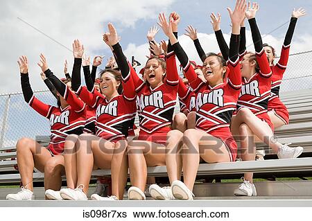 Cheerleaders on bleachers View Large Photo Image Stock Photograph - Cheerleaders on bleachers. Fotosearch