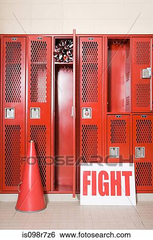 Stock Photograph - Cheerleading equipment in locker room. Fotosearch