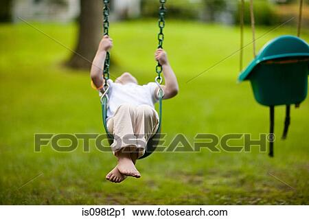 Child on swing View Large Photo Image Stock Image - Child on swing. Fotosearch