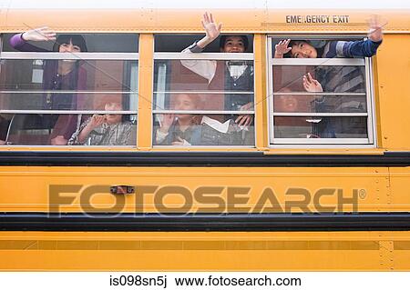 Stock Image - Children on school bus. Fotosearch