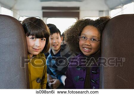 Stock Image - Children on school bus. Fotosearch