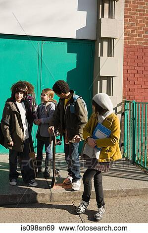 Stock Photo - Children outside school. Fotosearch