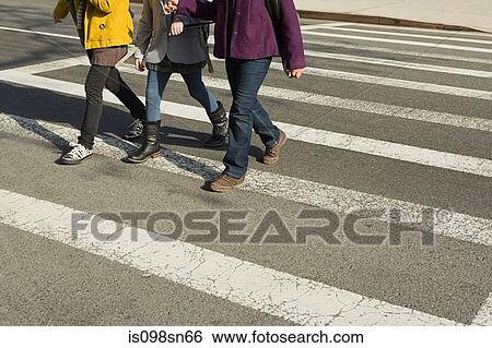 Children walking across road View Large Photo Image Stock Photograph - Children walking across road. Fotosearch