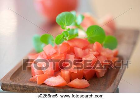 Chopped tomatoes and herbs View Large Photo Image Stock Photography - Chopped tomatoes and herbs. Fotosearch