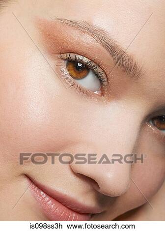 Close up of young woman's face View Large Photo Image Stock Image - Close up of young woman's face. Fotosearch