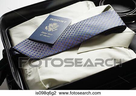 Clothes folded in a suitcase View Large Photo Image Stock Image - Clothes folded in a suitcase. Fotosearch