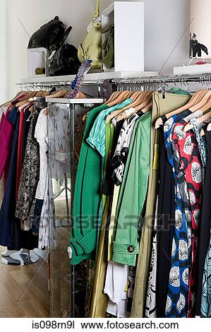 Clothing rail in store View Large Photo Image Stock Image - Clothing rail in store. Fotosearch