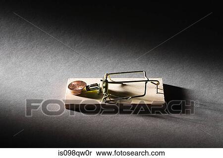 Stock Photography - Coins on mousetrap. Fotosearch