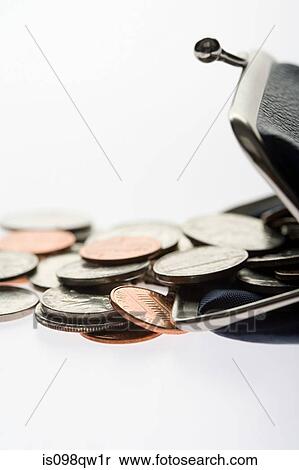 Coins spilling from purse View Large Photo Image Stock Photography - Coins spilling from purse. Fotosearch