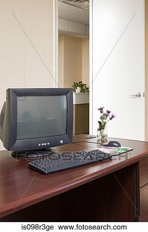 Stock Image - Computer on office desk. Fotosearch