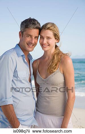 Couple at the coast View Large Photo Image Stock Image - Couple at the coast. Fotosearch