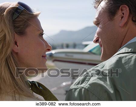 Couple by private aeroplane View Large Photo Image Stock Image - Couple by private aeroplane. Fotosearch