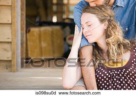 Couple enjoying lakeside vacation View Large Photo Image Stock Image - Couple enjoying lakeside vacation. Fotosearch