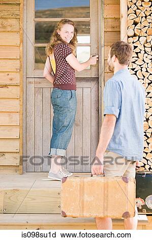 Stock Image - Couple enjoying lakeside vacation. Fotosearch