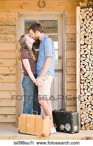 Stock Photograph - Couple enjoying lakeside vacation. Fotosearch