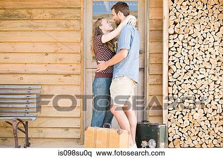 Stock Photography - Couple enjoying lakeside vacation. Fotosearch
