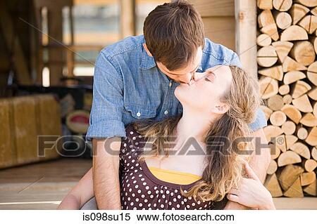 Stock Photography - Couple enjoying lakeside vacation. Fotosearch