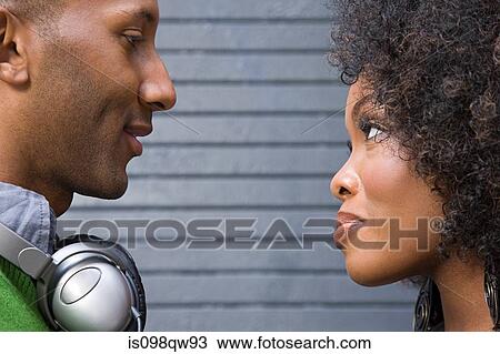Stock Image - Couple face to face. Fotosearch