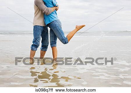 Couple hugging in the sea View Large Photo Image Stock Image - Couple hugging in the sea. Fotosearch