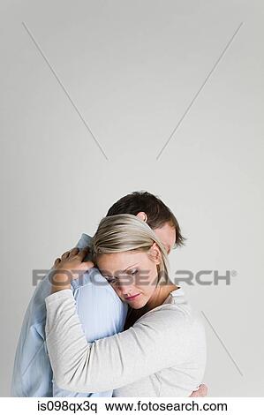 Stock Photography - Couple hugging. Fotosearch