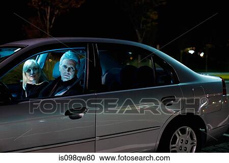 Stock Image - Couple in car. Fotosearch