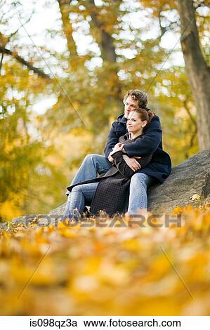 Stock Image - Couple in park. Fotosearch