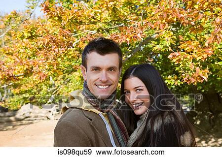 Stock Photo - Couple in park. Fotosearch