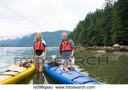 Couple kayaking View Large Photo Image Stock Photograph - Couple kayaking. Fotosearch