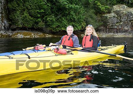 Couple kayaking View Large Photo Image Stock Photography - Couple kayaking. Fotosearch