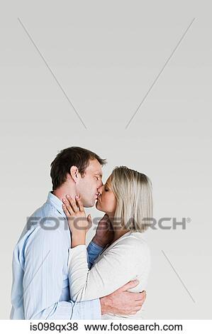 Couple kissing View Large Photo Image Stock Photo - Couple kissing. Fotosearch