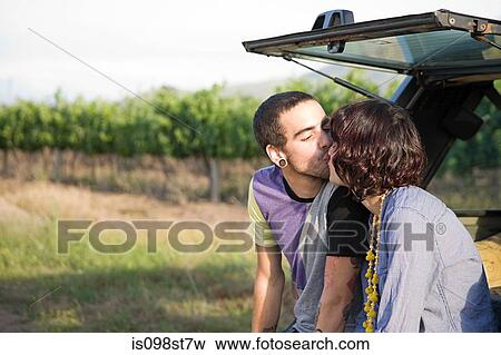 Stock Photo - Couple kissing. Fotosearch