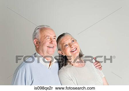 Couple looking up View Large Photo Image Stock Photography - Couple looking up. Fotosearch